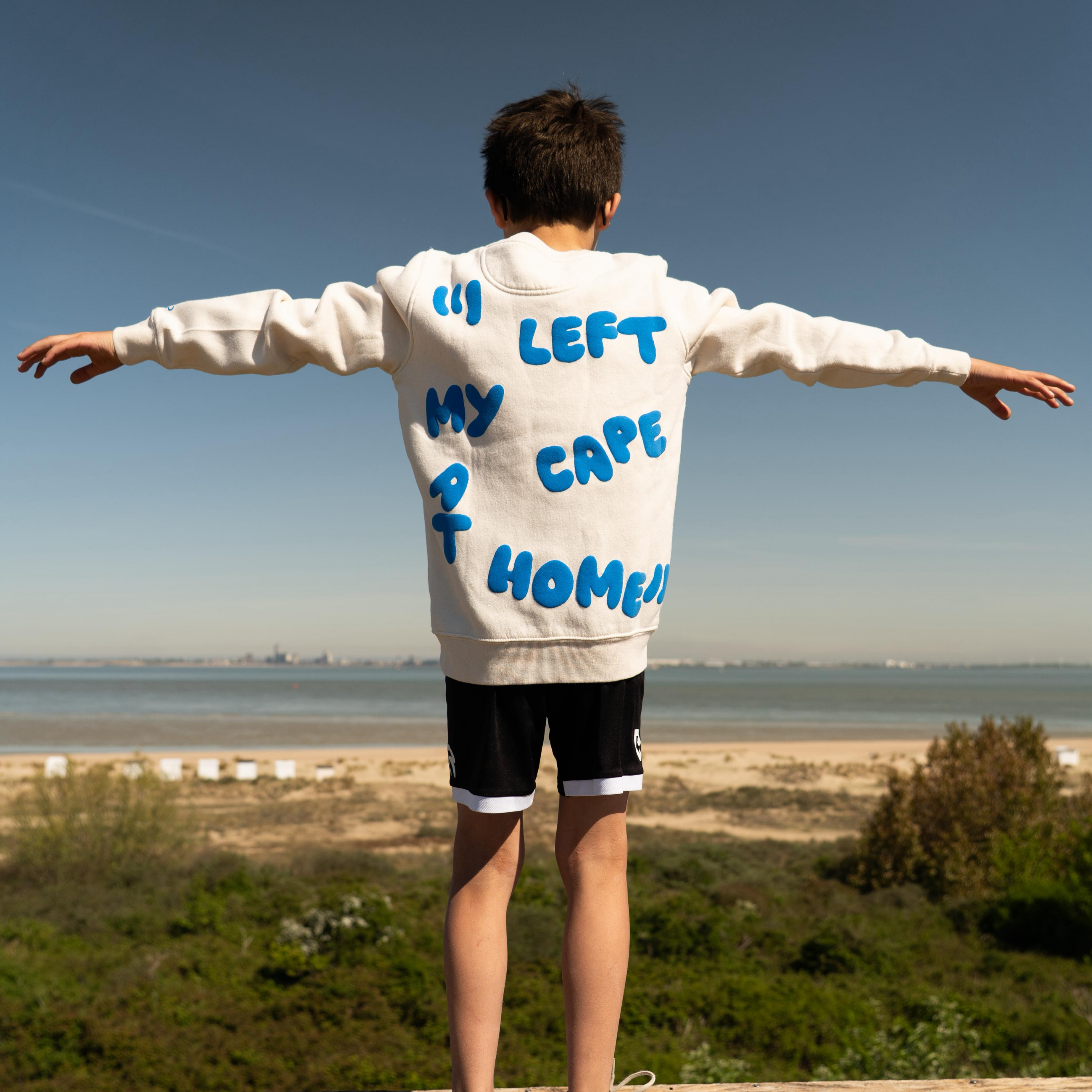 " I left my cape at home " | Sweater